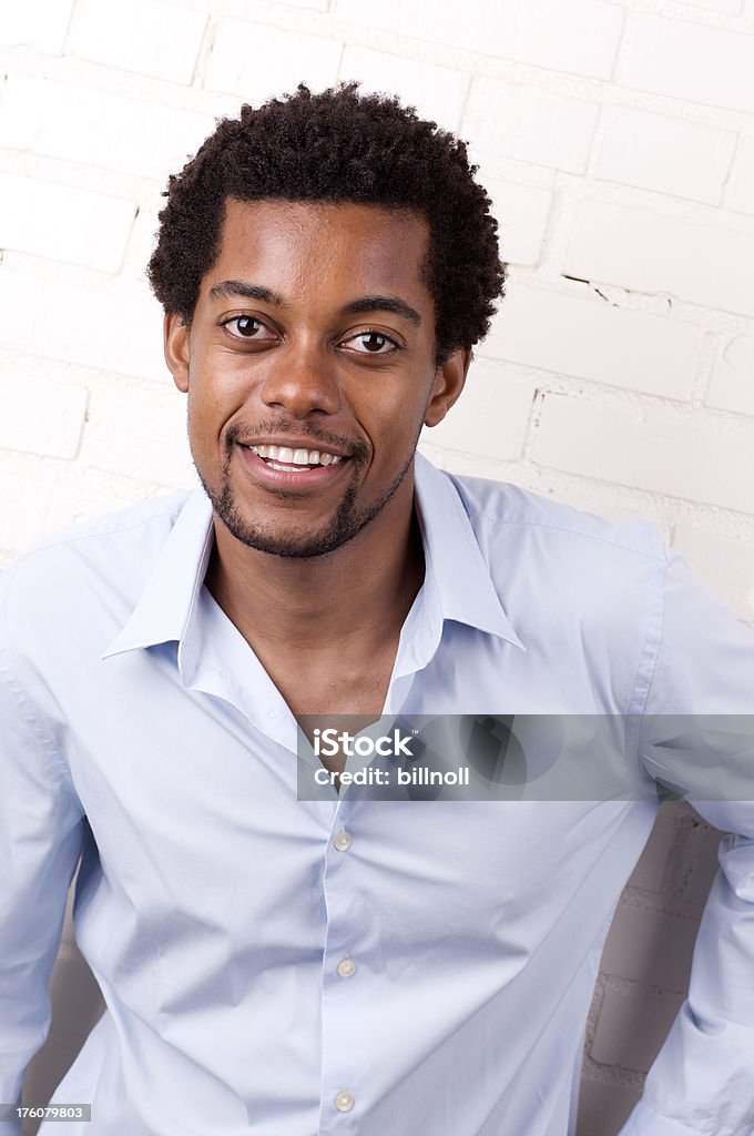 Young attractive male smiling at camera Please view more photos of this adult male! African Ethnicity Stock Photo