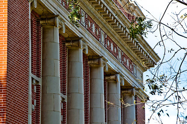 istock Detail of Classical Style Red Brick County Courthouse with Columns 176080092