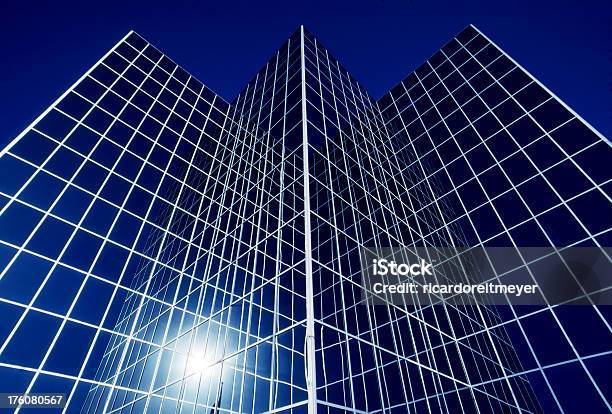 Downtown Glass Surface Modern Office Building Reflects Deep Blue Sky Stock Photo - Download Image Now