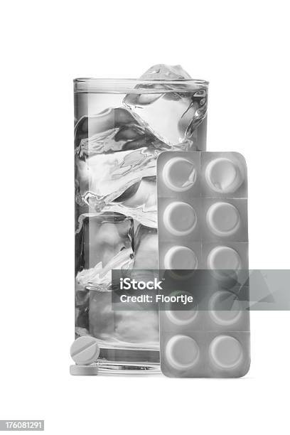 Medical Painkillers And Water Stock Photo - Download Image Now - Drinking Glass, Glass - Material, Accidents and Disasters