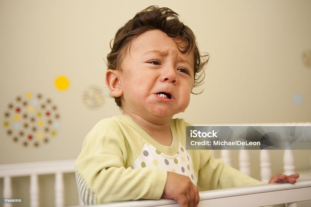 Frustrated Baby Boy One-year old B=baby boy expresses frustration. 12-17 Months Stock Photo