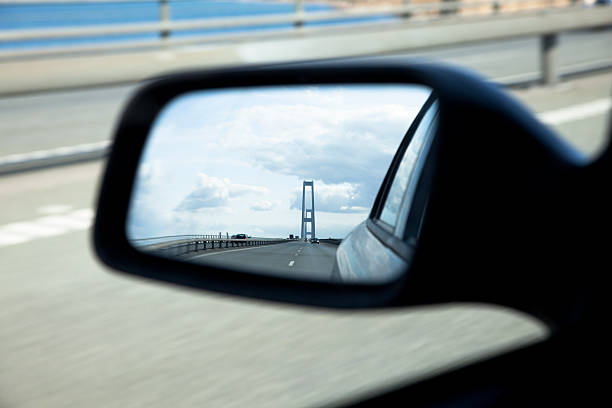 istock Big bridge in side view mirror. Traffic. Transportation. 176082073