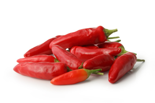 Red hot chilli pepers isolated on white background