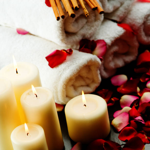 istock Spa items - Candles towles and rose petals 176083013
