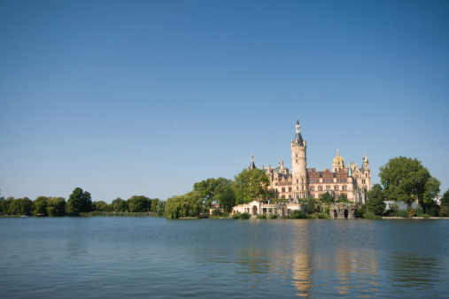 Castle in Schwerin (Germany) with the lake and a blue sky