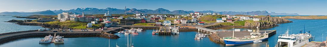 Clear blue panoramic skies over the tranquil town of Stykkisholmur, Iceland. ProPhoto RGB profile for maximum color fidelity and gamut.