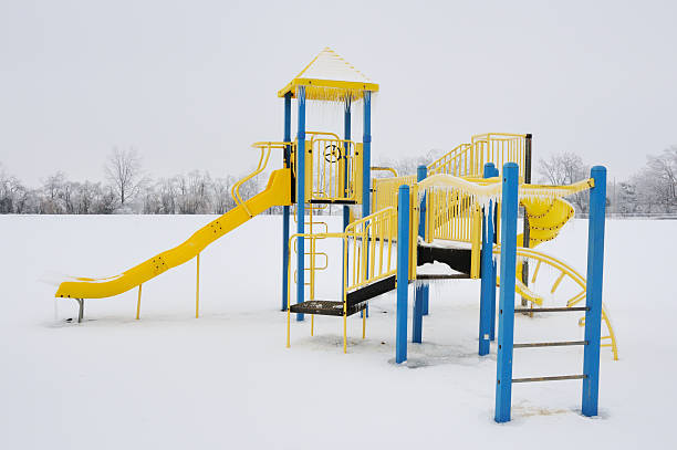 istock Schoolyard Playground Equipment After Winter Snow 176083550