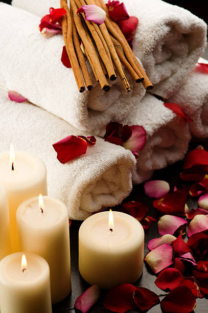istock Spa items - Candles towles and rose petals 176084259