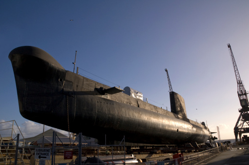 An old submarine on dry dock.