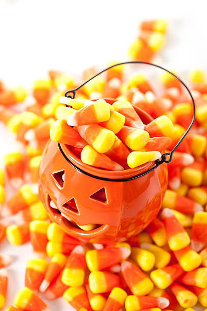 candy corn - candy halloween candy corn jar foto e immagini stock