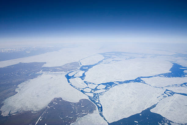 Global Warming Melting ice pack in the polar region. icecap photos stock pictures, royalty-free photos & images