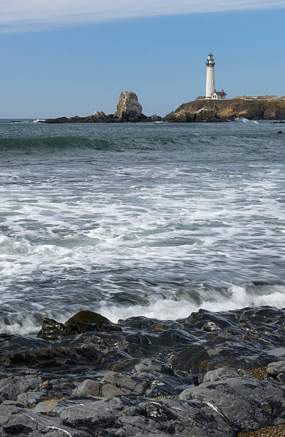 istock Pacific Coast Lighthouse and Rocky Shore 176085720