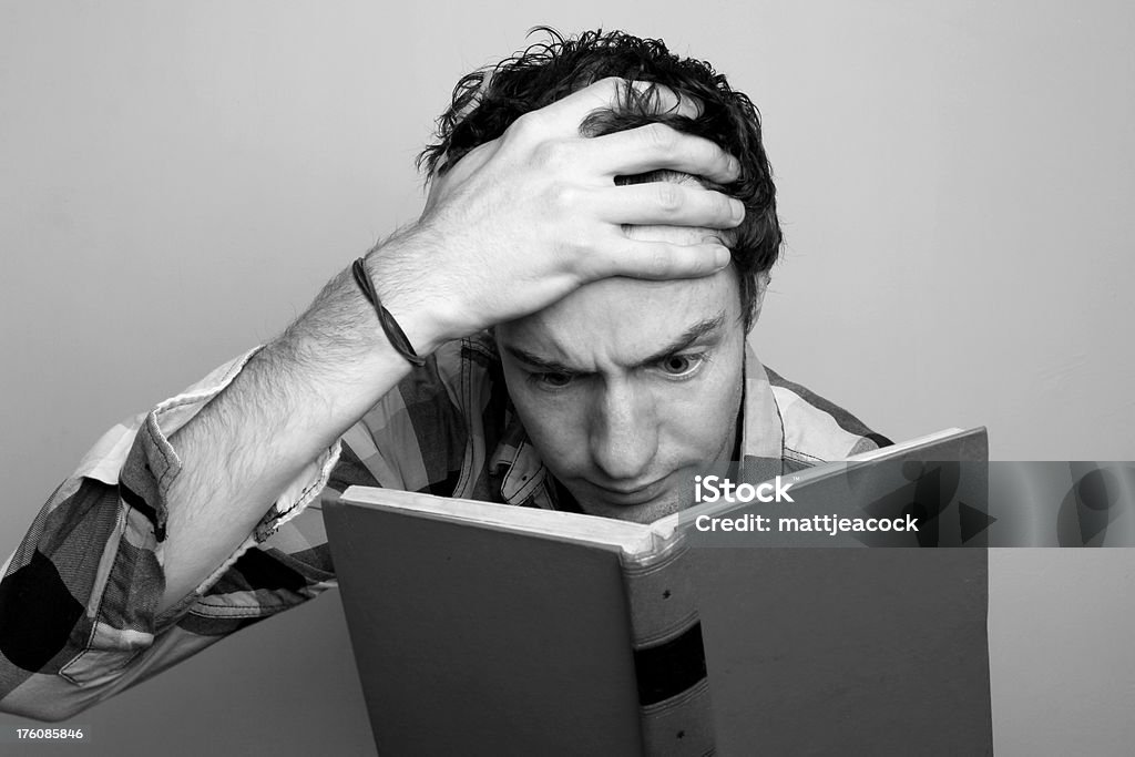 Get reading young man reading Adult Stock Photo