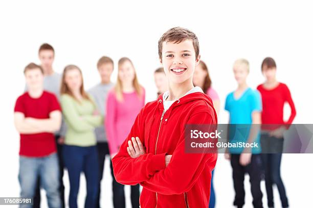 Smiling Boy With Friends In The Background Stock Photo - Download Image Now - 14-15 Years, 16-17 Years, Adult