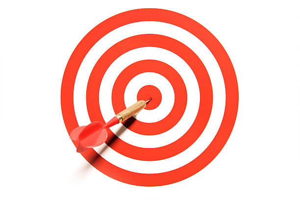 Red Dart Hitting Bullseye on Circular Target With White Background
