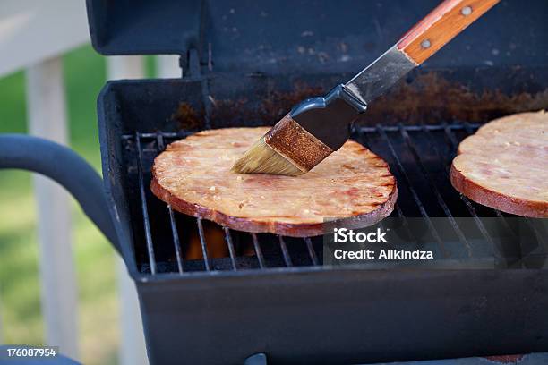 Basting Grilled Ham Steaks Stock Photo - Download Image Now - Applying, Barbecue - Meal, Barbecue Grill