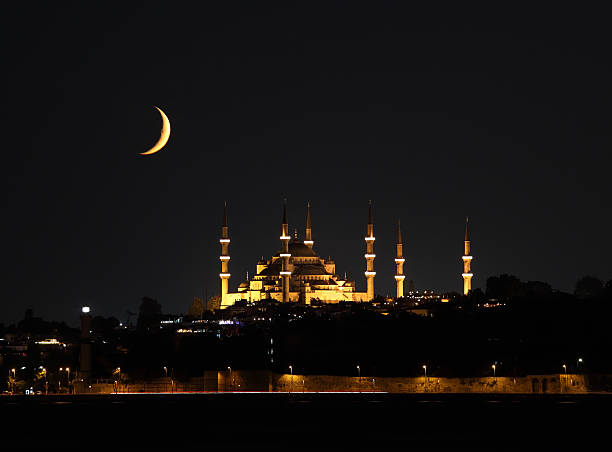 Blue mosque in Ramadan Sultanahmet mosque and crescent during Ramadan in Istanbul/Turkey.  . islam moon stock pictures, royalty-free photos & images