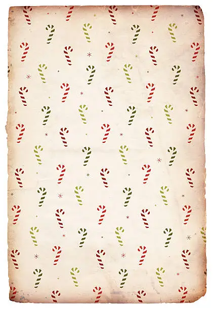 Image of an old, grungy piece of paper with a retro christmas candycane pattern. Great holiday background file. 