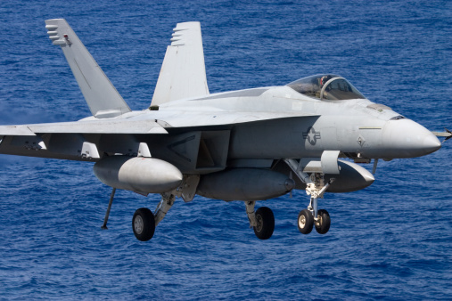 Close up of a modern US Navy jet fighter at sea.