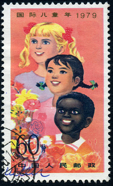 Multi-Ethnic Group of Children A 60 fen Chinese postage stamp issued in 1979 celebrating the International Year of the Child. chinese postage stamp stock pictures, royalty-free photos & images