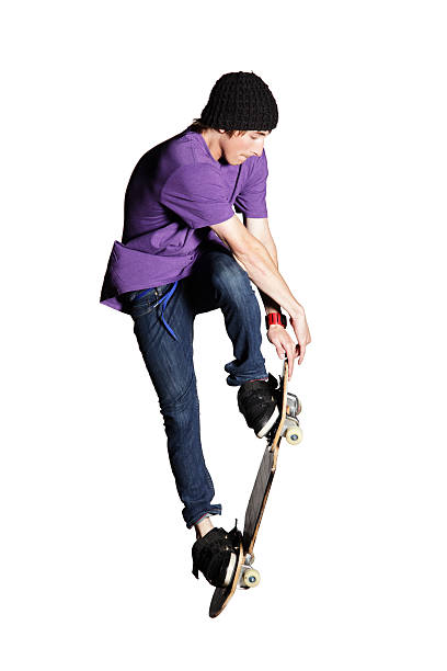 istock Artistic skateboarder caught mid-air, isolated  on white 176089426