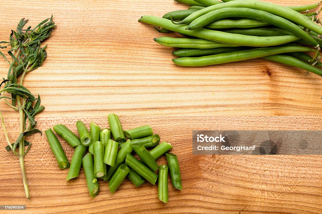 Green beans Green beans on a wodden Board. Close-up Stock Photo