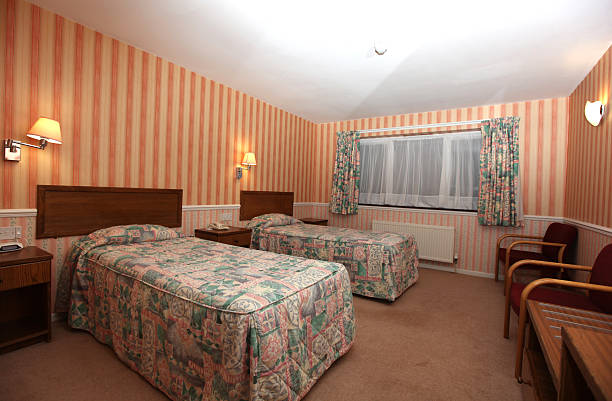 istock Typical Hotel bedroom with two twin beds. 176090418