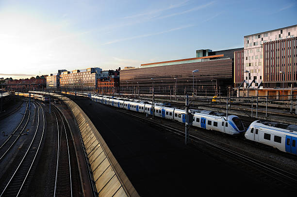 istock Trainstation and departing trains in sunset 176090609
