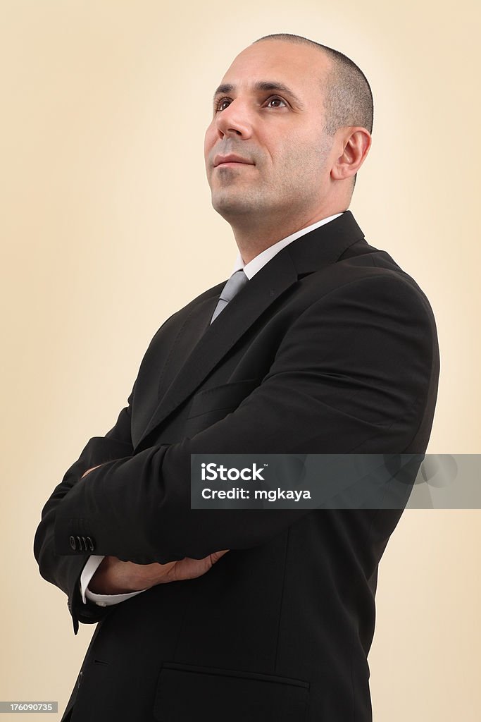 Businessman Portrait Portrait of businessman is looking away with arms crossed. 40-44 Years Stock Photo