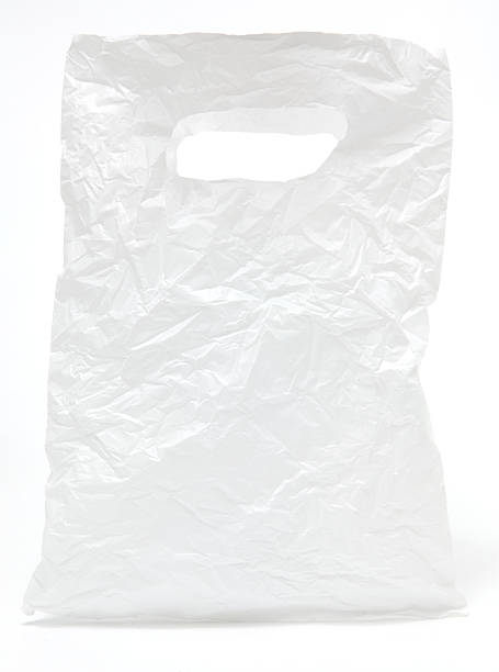 Crumpled white plastic bag stock photo