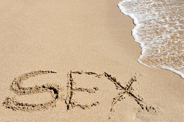 istock Sex on the beach, written in sand 176092593