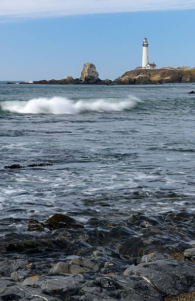 istock Pacific Coast Lighthouse and Rocky Shore 176092723