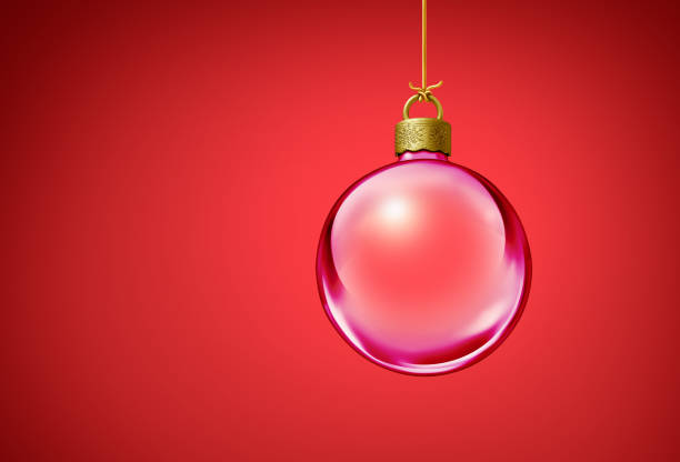 XXXL photo, macro with very short depth of field to highlight the golden cap on this Christmas ornament with a high key blue sparkle bakground.