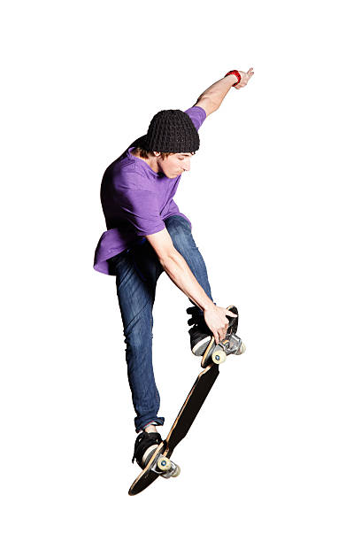 istock Artistic skateboarder caught mid-air, isolated  on white 176094039