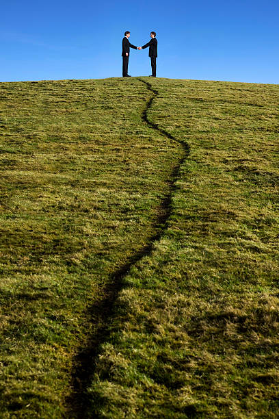 End of winter and start of Spring with February  in the beautiful outdoors with ancient towns, countryside and the imposing Old Sarum castle  hilltop fort from a distance in  Wiltshire, England