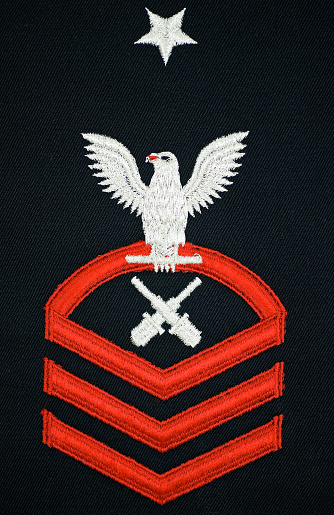 Rank insignia of a Navy Chief Petty Officer.