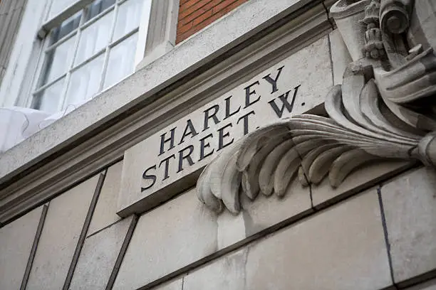 "An original Harley Street road sign, carved into a buildings fascard. Harley Street is world famous and has reputation as the Uk's most prestigeous location for private medical practitioners with a wide range of dental, plastic sugery, and other medical specialists, clinics and private hospitals."