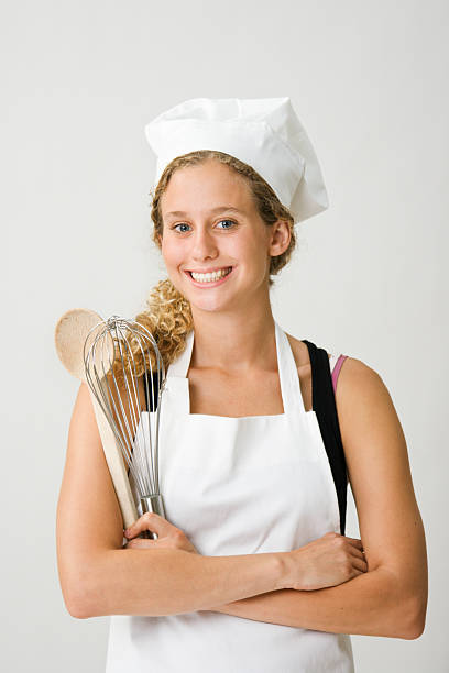 istock Young Woman Chef on White Background 176095194