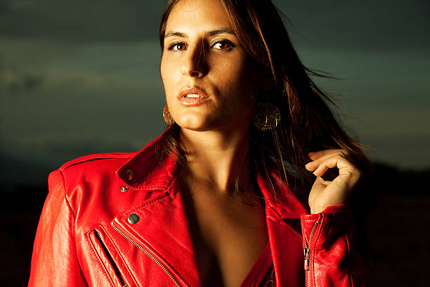 istock Young Woman In Red Leather Jacket 176095253