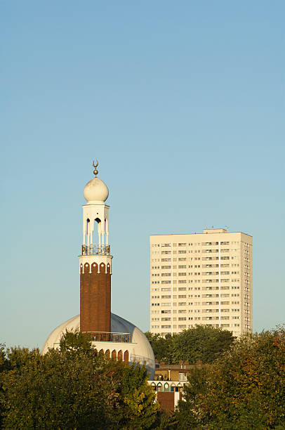Birmingham Central Mosque and nearby tower block in Birmingham UK.See more British mosque photos in the