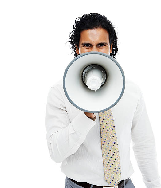 ritratto di un uomo d'affari arrabbiato tenendo un megafono - complaining attitude megaphone business foto e immagini stock