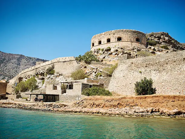 Spinalonga Fortress on the small Kalidonia Island (Spinalonga Island) . Venetian Fortress built approx. in the year 1579 was used as the last active leprosy colony to quarantaine leprous people until 1957. Crete,