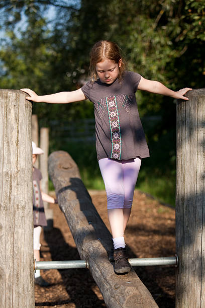 istock Little girl climbing a recreational circuit 176096011