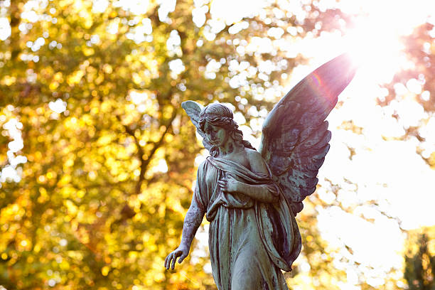 istock angel scupltue with flares 176096507