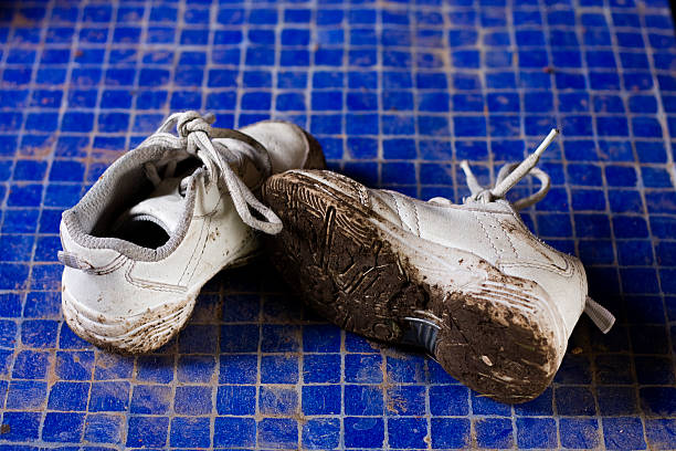 Muddy feet stock photo