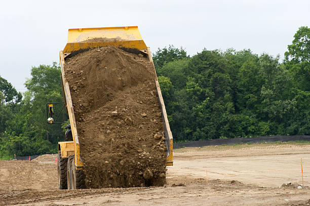 istock Truck Dumping Gravel 176097840