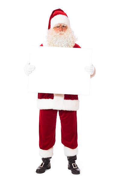 istock Santa holding blank information sign 176097851