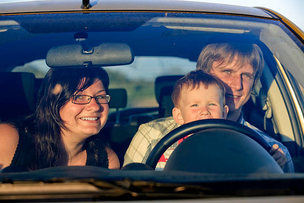 istock Young parents and son in the car 176097993