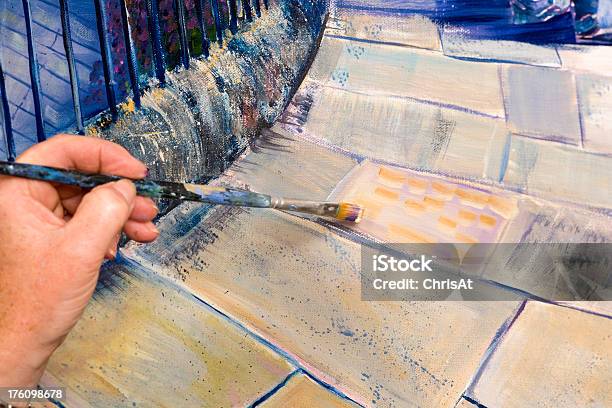 Lady Artist At Work Painting A Large Acrylic Artwork Stock Photo - Download Image Now