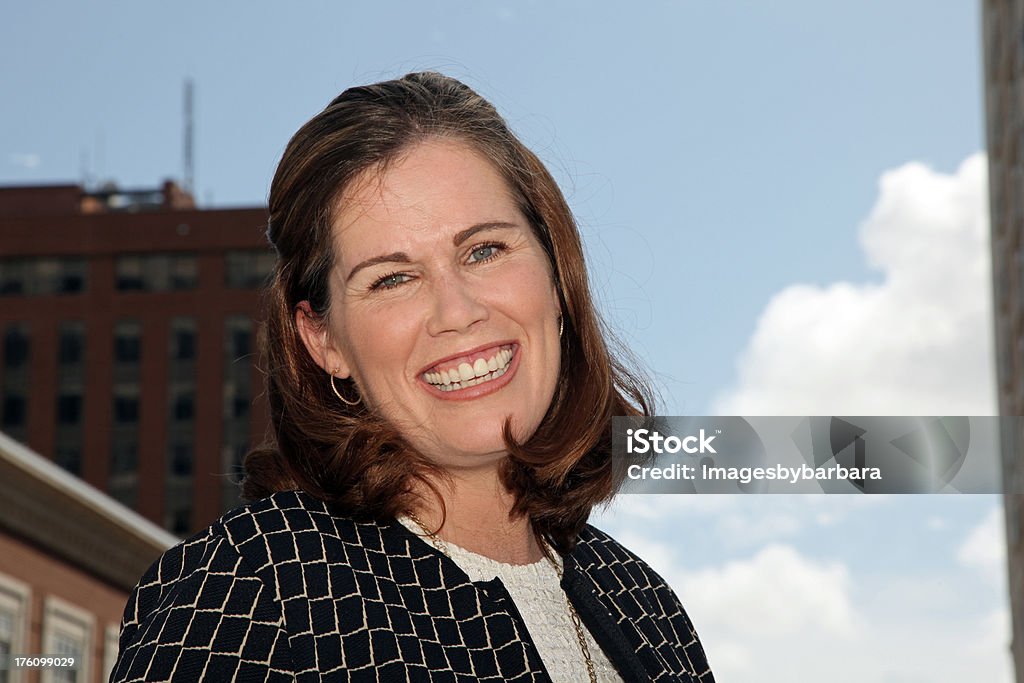 Smile Smiling woman outside on break from work. 35-39 Years Stock Photo